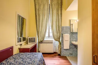 Letto o letti in una camera di Hotel Romagna
