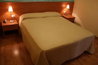 Letto o letti in una camera di Hotel Romagna