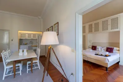 Letto o letti in una camera di Raso cozy penthouse near the Duomo