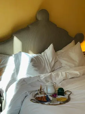 Letto o letti in una camera di Casa Howard Firenze - Residenza d'Epoca