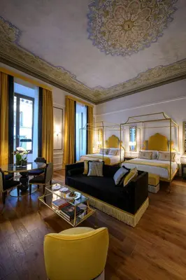 Letto o letti in una camera di IL Tornabuoni The Unbound Collection by Hyatt