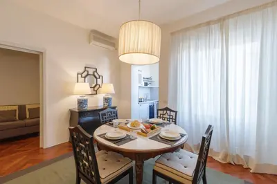 Area soggiorno di Damasco penthouse with terrace near the Duomo