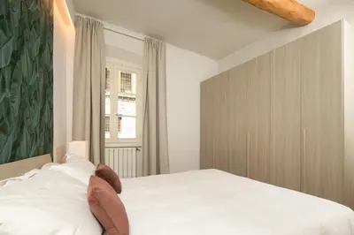 Letto o letti in una camera di il giaggiolo apartment