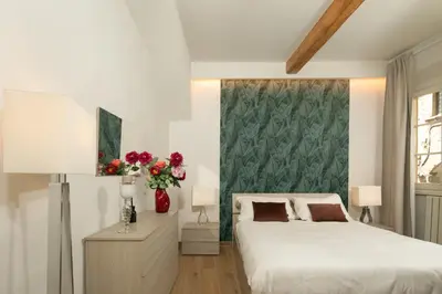 Letto o letti in una camera di il giaggiolo apartment