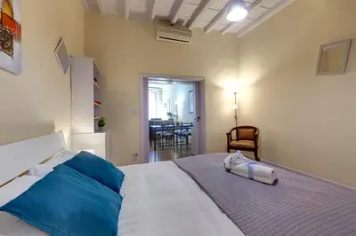 Letto o letti in una camera di Oriuolo Apartment by Mamo Florence