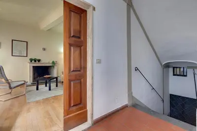 Area soggiorno di Oriuolo Apartment by Mamo Florence