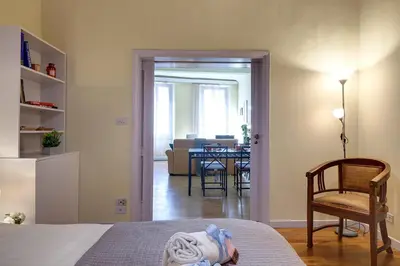 Letto o letti in una camera di Oriuolo Apartment by Mamo Florence