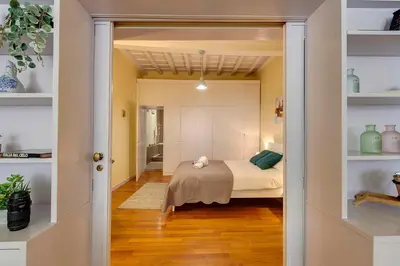 Letto o letti in una camera di Oriuolo Apartment by Mamo Florence