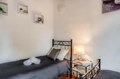 Letto o letti in una camera di Boboli Guest House