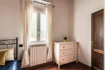 Letto o letti in una camera di Boboli Guest House