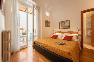 Letto o letti in una camera di Terrazza Foscolo - Flo Apartments