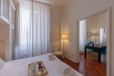Letto o letti in una camera di Seta spacious apartment next to the Duomo