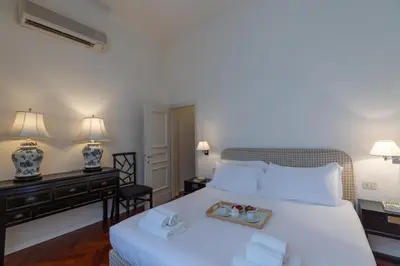 Letto o letti in una camera di Seta spacious apartment next to the Duomo