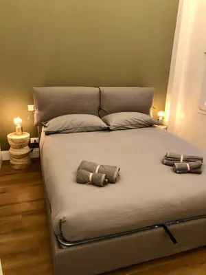 Letto o letti in una camera di Novella Suite