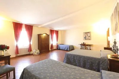 Letto o letti in una camera di Hotel Bavaria