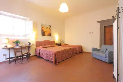 Letto o letti in una camera di Hotel Bavaria
