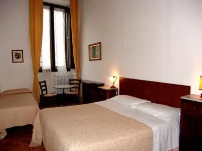 Letto o letti in una camera di Albergo San Giovanni