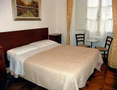 Letto o letti in una camera di Albergo San Giovanni