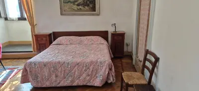 Letto o letti in una camera di Albergo San Giovanni