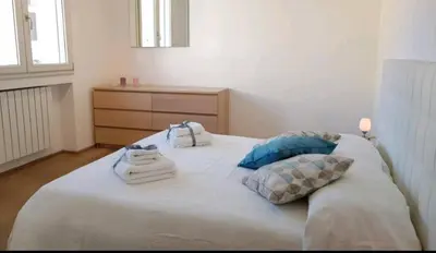 Letto o letti in una camera di Bellagio sweet home
