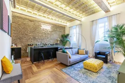 Area soggiorno di PALAZZO DEI SIGNORI LUXURY DESIGN LOFT APT with view, Florence