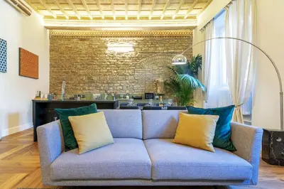 Area soggiorno di PALAZZO DEI SIGNORI LUXURY DESIGN LOFT APT with view, Florence