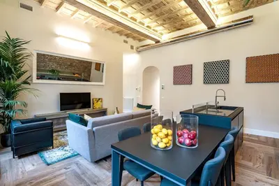 Area soggiorno di PALAZZO DEI SIGNORI LUXURY DESIGN LOFT APT with view, Florence