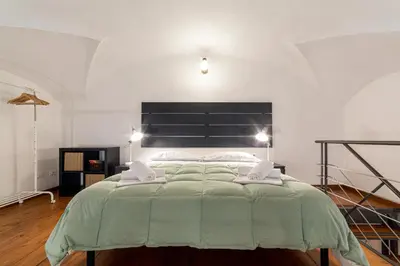 Letto o letti in una camera di Pepi loft in a historical building