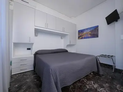 Letto o letti in una camera di Hotel Careggi