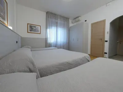 Letto o letti in una camera di Hotel Careggi