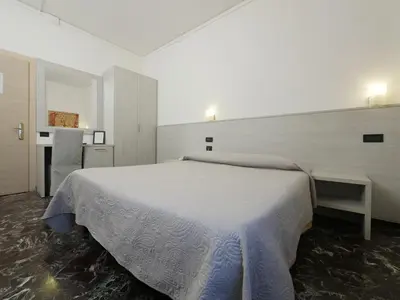 Letto o letti in una camera di Hotel Careggi