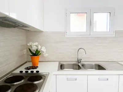 Cucina o angolo cottura di Stunning Apartment With An Amazing Terrace