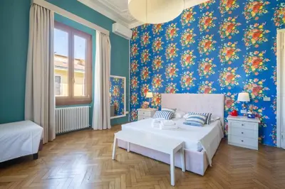 Letto o letti in una camera di Hotel Jolì