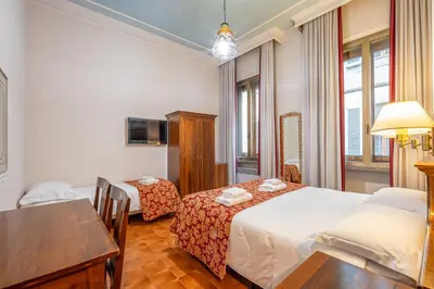 Letto o letti in una camera di Hotel City