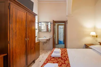 Letto o letti in una camera di Hotel City