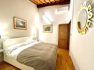 Letto o letti in una camera di Charming Apartment in the very heart of Florence