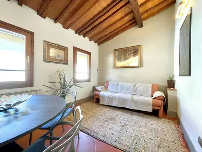 Area soggiorno di Charming Apartment in the very heart of Florence
