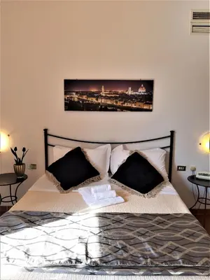 Letto o letti in una camera di Hotel Victoria