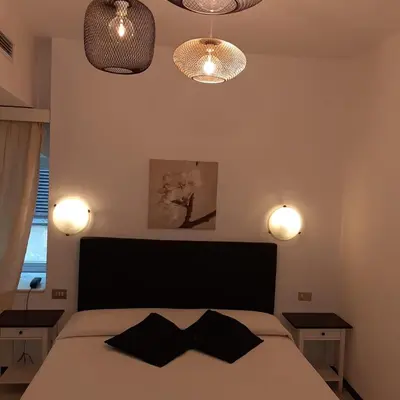 Letto o letti in una camera di Hotel Victoria