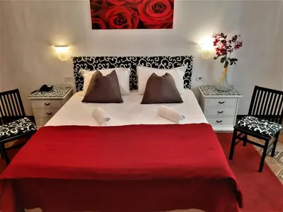 Letto o letti in una camera di Hotel Victoria