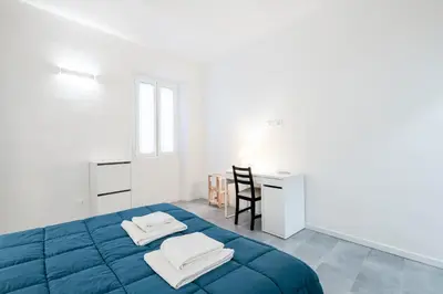 Letto o letti in una camera di GuestHost - Viuzzo 7 - Florence White Apartment