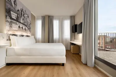 Letto o letti in una camera di Wyndham Garden Florence