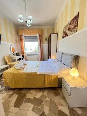 Letto o letti in una camera di Souvenir Maya