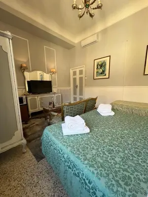 Letto o letti in una camera di Souvenir Maya