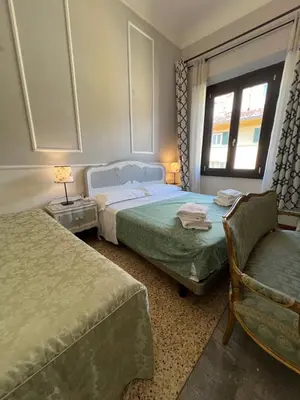 Letto o letti in una camera di Souvenir Maya