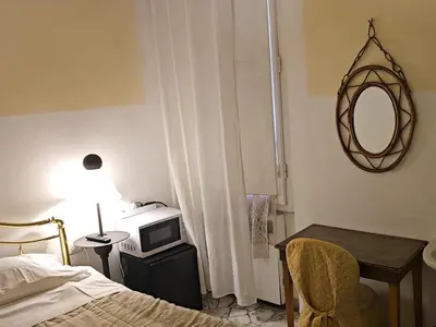 Letto o letti in una camera di Souvenir Maya