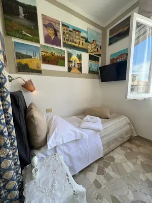 Letto o letti in una camera di Souvenir Maya