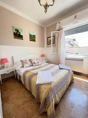 Letto o letti in una camera di Souvenir Maya