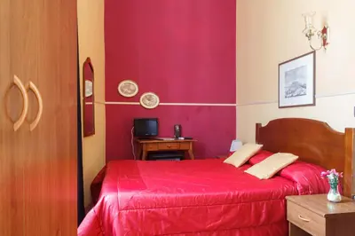 Letto o letti in una camera di Hotel San Lorenzo