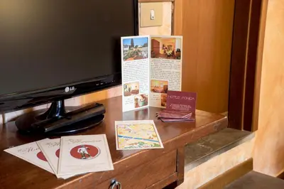 TV o dispositivi per l'intrattenimento presso Hotel Monica